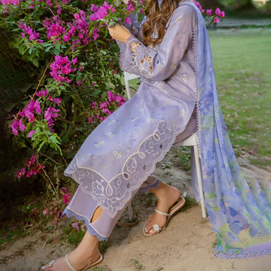 Embroidered lawn suit from Rang Rasiya Carnation Festive Collection, featuring intricate lace and floral designs. Vibrant floral embroidered lawn suit from Rang Rasiya Carnation Festive Collection, exuding summer charm with intricate lacework. Soft pastel floral embroidered lawn suit from Rang Rasiya Carnation Festive Collection, featuring lace sleeves and a delicate pattern.