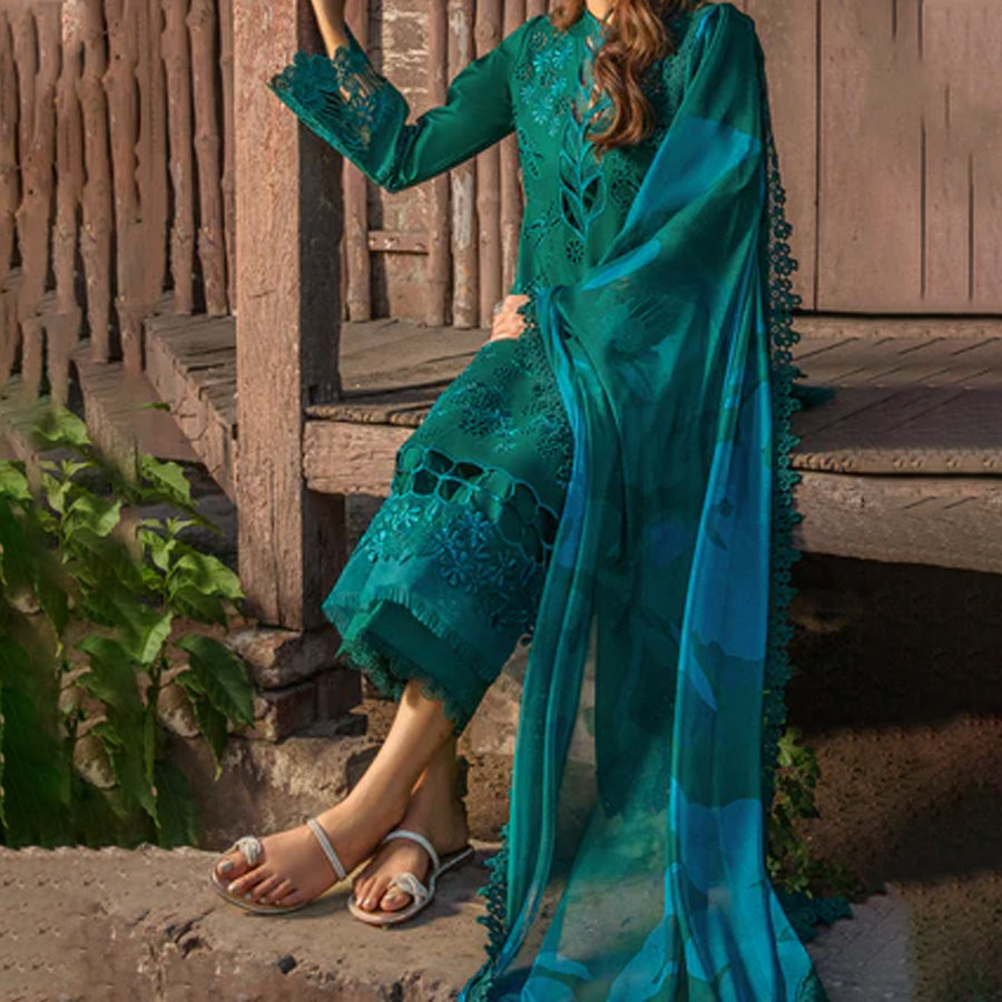 Embroidered lawn suit from Rang Rasiya Carnation Festive Collection, featuring intricate lace and floral designs. Vibrant floral embroidered lawn suit from Rang Rasiya Carnation Festive Collection, exuding summer charm with intricate lacework. Soft pastel floral embroidered lawn suit from Rang Rasiya Carnation Festive Collection, featuring lace sleeves and a delicate pattern.