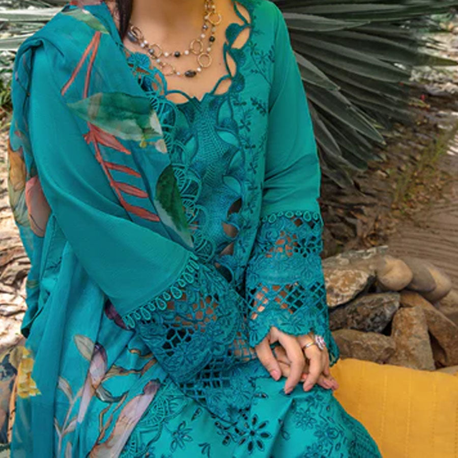 Embroidered lawn suit from Rang Rasiya Carnation Festive Collection, featuring intricate lace and floral designs. Vibrant floral embroidered lawn suit from Rang Rasiya Carnation Festive Collection, exuding summer charm with intricate lacework. Soft pastel floral embroidered lawn suit from Rang Rasiya Carnation Festive Collection, featuring lace sleeves and a delicate pattern.