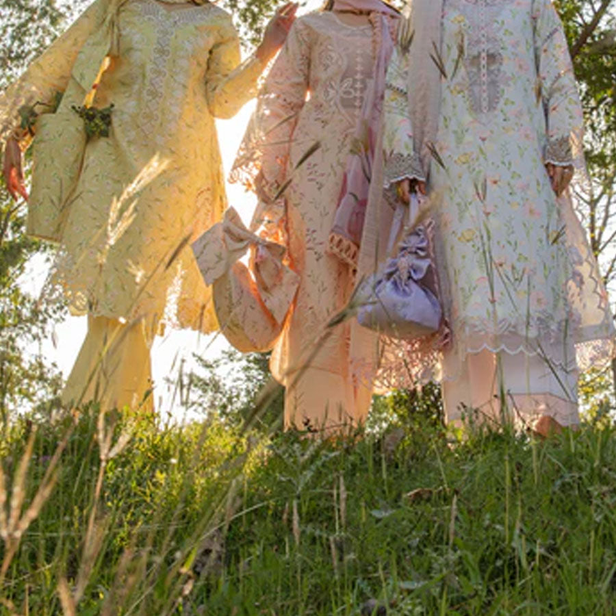 Embroidered lawn suit from Rang Rasiya Carnation Festive Collection, featuring intricate lace and floral designs. Vibrant floral embroidered lawn suit from Rang Rasiya Carnation Festive Collection, exuding summer charm with intricate lacework. Soft pastel floral embroidered lawn suit from Rang Rasiya Carnation Festive Collection, featuring lace sleeves and a delicate pattern.