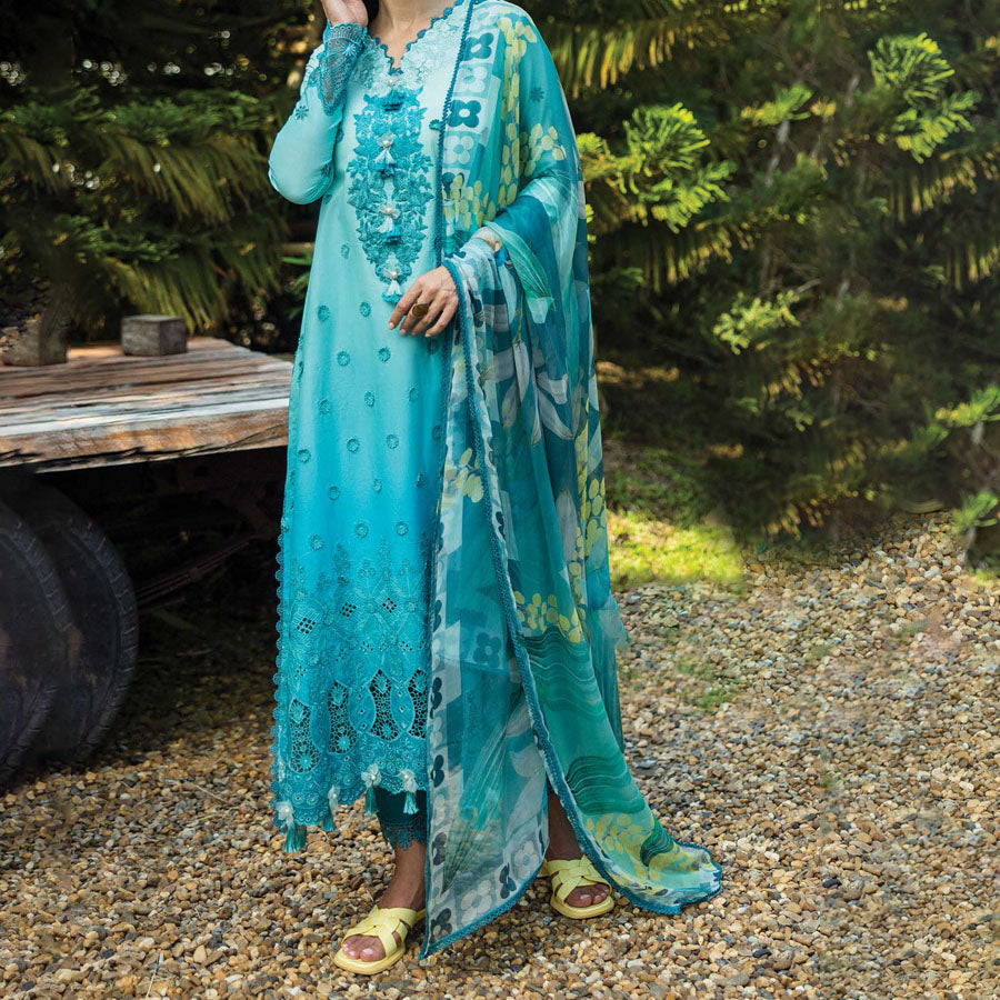 A model wearing a pastel embroidered lawn suit, featuring delicate floral patterns and a matching dupatta, ideal for summer occasions, sitting in a garden setting, showcasing traditional elegance and comfort, wearing a chickenkari embroidered dress.