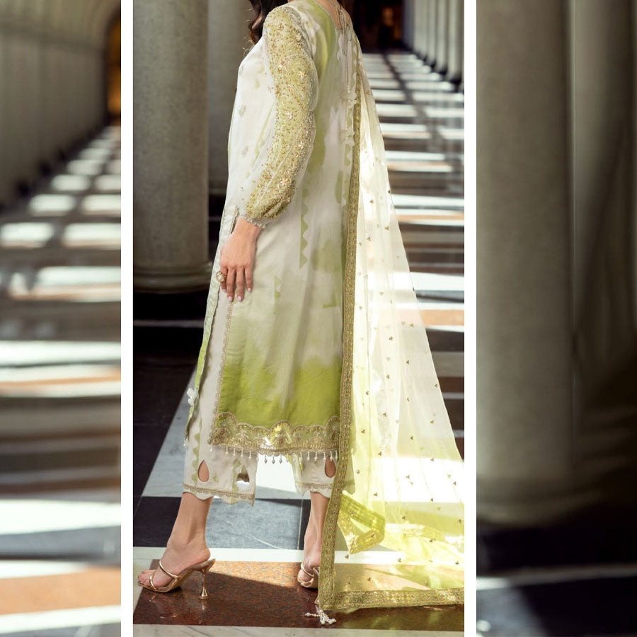 Charizma Festive Unstitched Collection 2025 – Two models wearing elegant embroidered Pakistani suits in pastel blue and golden yellow, featuring intricate handwork, sequins, and delicate embellishments, perfect for Eid celebrations and festive occasions.