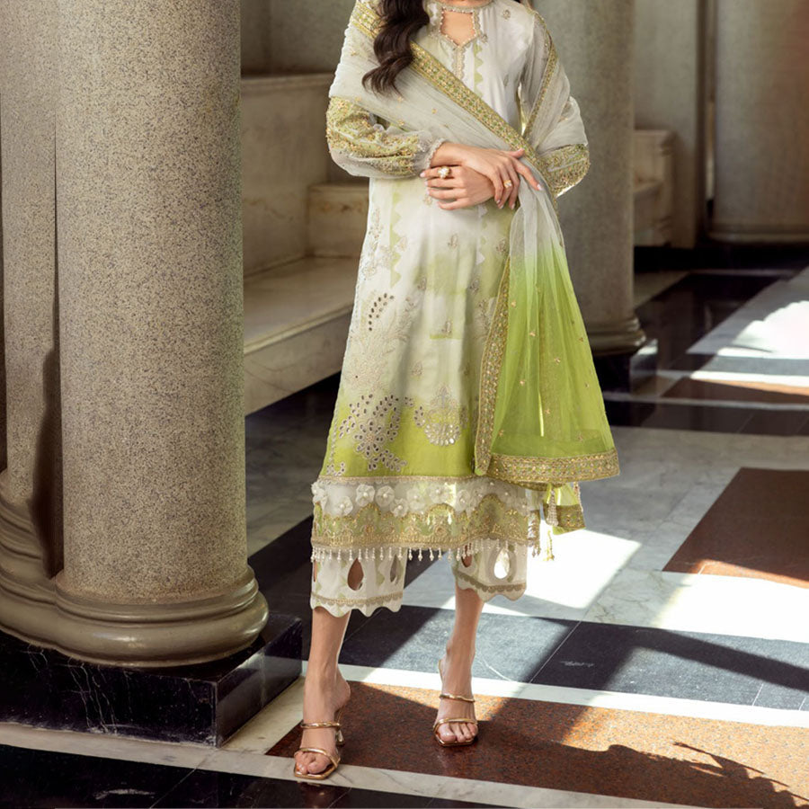 Charizma Festive Unstitched Collection 2025 – Two models wearing elegant embroidered Pakistani suits in pastel blue and golden yellow, featuring intricate handwork, sequins, and delicate embellishments, perfect for Eid celebrations and festive occasions.