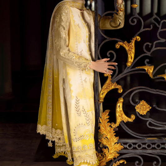 Charizma Festive Unstitched Collection 2025 – Two models wearing elegant embroidered Pakistani suits in pastel blue and golden yellow, featuring intricate handwork, sequins, and delicate embellishments, perfect for Eid celebrations and festive occasions.