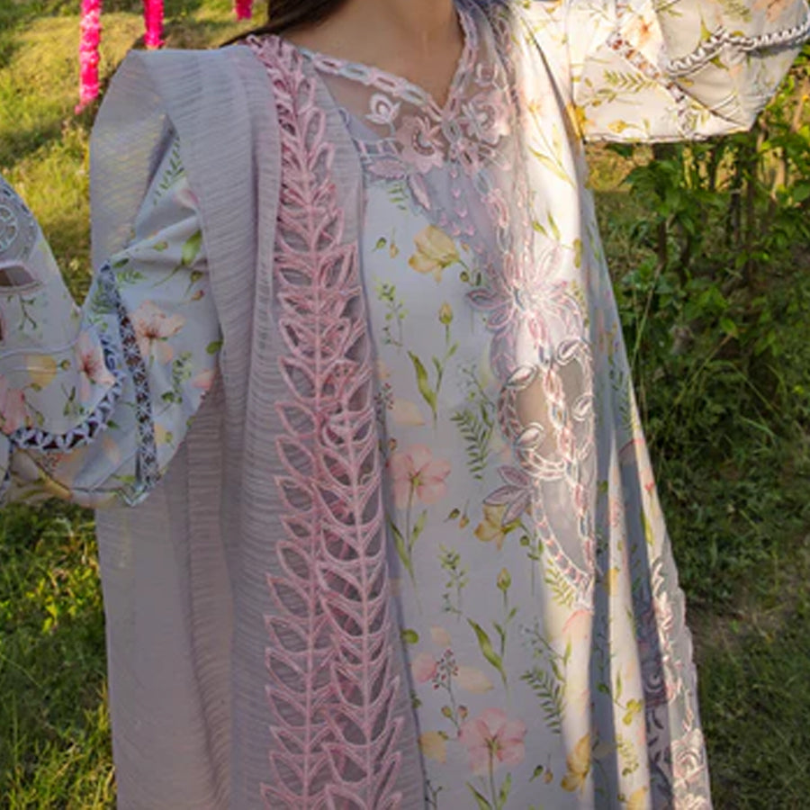 Embroidered lawn suit from Rang Rasiya Carnation Festive Collection, featuring intricate lace and floral designs. Vibrant floral embroidered lawn suit from Rang Rasiya Carnation Festive Collection, exuding summer charm with intricate lacework. Soft pastel floral embroidered lawn suit from Rang Rasiya Carnation Festive Collection, featuring lace sleeves and a delicate pattern.