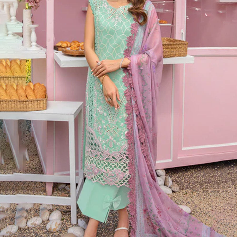 Embroidered lawn suit from Rang Rasiya Carnation Festive Collection, featuring intricate lace and floral designs. Vibrant floral embroidered lawn suit from Rang Rasiya Carnation Festive Collection, exuding summer charm with intricate lacework. Soft pastel floral embroidered lawn suit from Rang Rasiya Carnation Festive Collection, featuring lace sleeves and a delicate pattern.